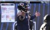 Dec 4, 2022; Chicago, Illinois, USA; Chicago Bears quarterback Justin Fields (1) celebrates after scoring a touchdown against the Green Bay Packers during the first half at Soldier Field.