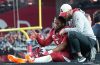Dec 12, 2022; Glendale, Ariz., USA; Arizona Cardinals quarterback Kyler Murray (1) waves as he’s carted off the field after an injury against the New England Patriots during the first quarter at State Farm Stadium.