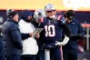 Dec 24, 2022; Foxborough, Massachusetts, USA; New England Patriots quarterback Mac Jones (10) checks with head coach Bill Belichick, left, and senior football advisor Matt Patricia, second from left, during the second half against the Cincinnati Bengals at Gillette Stadium.