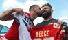 Sep 17, 2017; Kansas City, MO, USA; Kansas City Chiefs tight end Travis Kelce (87) kisses Philadelphia Eagles center Jason Kelce (62) after the game at Arrowhead Stadium.