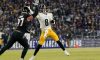 Jan 1, 2023; Baltimore, Maryland, USA; Pittsburgh Steelers quarterback Kenny Pickett (8) throws against Baltimore Ravens defensive end Brent Urban (97) during the first half at M&T Bank Stadium.