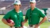 matthew mcconaughey stands on marshall's football field in a scene from "we are marshall"