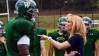 sandra bullock points at her fellow actor's chest during football practice in a scene from the blind side