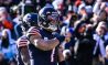 Nov 13, 2022; Chicago, Illinois, USA; Chicago Bears quarterback Justin Fields (1) celebrates his rushing touchdown in the second quarter against the Detroit Lions at Soldier Field.