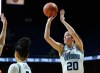 Villanova women's basketball player Maddy Siegrist, wearing a white jersey, takes a mid-range shot.