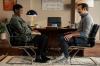 Sarah Niles and Jason Sudeikis sit across from each other in her office during a scene from Ted Lasso