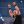Stone Cold Steve Austin holds his arms up during a WWE event