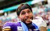 Harrison Smith with a white glove in hand and a wry smile as a member of the Vikings