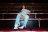 Stanford's Haley Jones sitting on bleachers for a photo shoot.