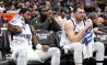 Feb 11, 2023; Sacramento, California, USA; Dallas Mavericks guard Kyrie Irving (2) and guard Luka Doncic (right) sit on the bench during the third quarter against the Sacramento Kings at Golden 1 Center.