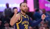 Stephen Curry reacts in shock to being called for a foul.
