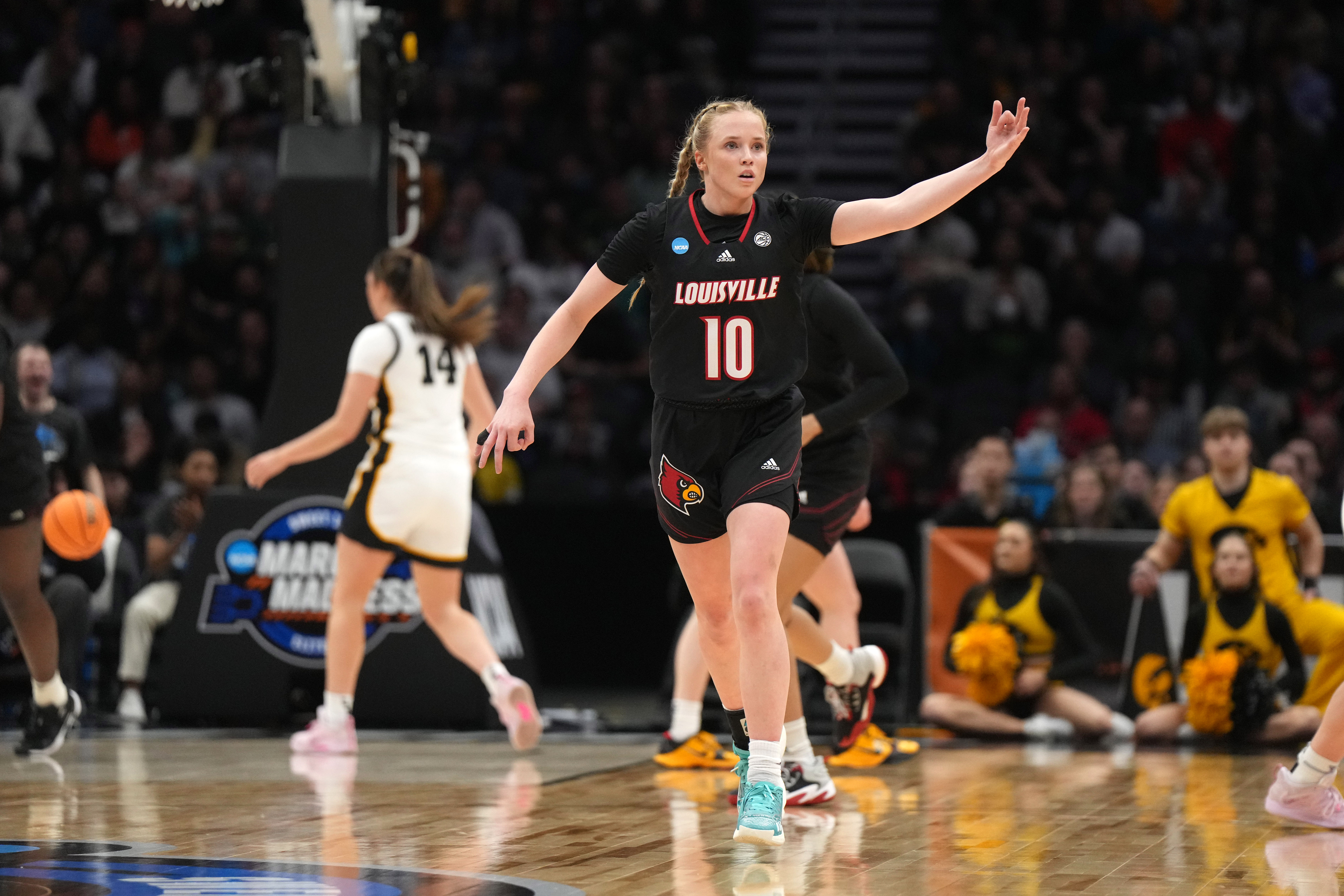 Hailey Van Lith celebrates a 3-point basket.