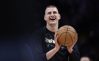 May 18, 2023; Denver, Colorado, USA; Denver Nuggets center Nikola Jokic (15) warms up before game two against the Los Angeles Lakers in the Western Conference Finals for the 2023 NBA playoffs at Ball Arena.