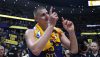 Nikola Jokic gestures with his fingers after winning NBA Finals.