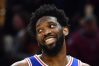 Apr 3, 2022; Cleveland, Ohio, USA; Philadelphia 76ers center Joel Embiid (21) smiles after a play during the second half against the Cleveland Cavaliers at Rocket Mortgage FieldHouse.
