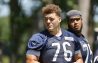 Jun 16, 2021; Lake Forest, Illinois, USA; Chicago Bears Teven Jenkins looks on during minicamp at Halas Hall.