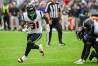 Sep 10, 2023; Baltimore, Maryland, USA; Houston Texans running back Dameon Pierce (31) carries the ball against the Baltimore Ravens during the second half at M&T Bank Stadium.