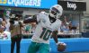 Sep 10, 2023; Inglewood, California, USA; Miami Dolphins wide receiver Tyreek Hill (10) celebrates after catching a 35-yard touchdown pass in the third quarter against the Miami Dolphins at SoFi Stadium.