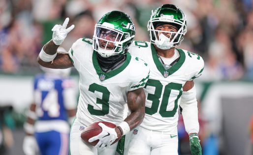 Sep 11, 2023; East Rutherford, New Jersey, USA; New York Jets safety Jordan Whitehead (3) celebrates after an interception with cornerback Michael Carter II (30) during the second half against the Buffalo Bills at MetLife Stadium.