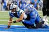 Lions defensive end Romeo Okwara tackles Carolina Panthers quarterback Bryce Young (9) during the second half at Ford Field in Detroit on Sunday, Oct. 8, 2023.