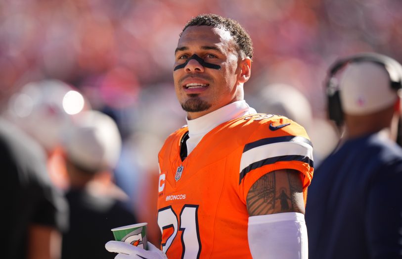 Oct 8, 2023; Denver, Colorado, USA; Denver Broncos safety Justin Simmons (31) on the sidelines in the first half against the New York Jets at Empower Field at Mile High.