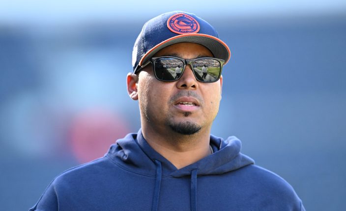 CHICAGO, ILLINOIS - OCTOBER 22: Chicago Bears general manager Ryan Poles walks the field before the game against the Las Vegas Raiders at Soldier Field on October 22, 2023 in Chicago, Illinois. (Photo by Quinn Harris/Getty Images)