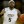 Marcus Jordan, son of Michael Jordan, dribbling a basketball, while wearing a UCF jersey and protective sports glasses, at UCF Arena