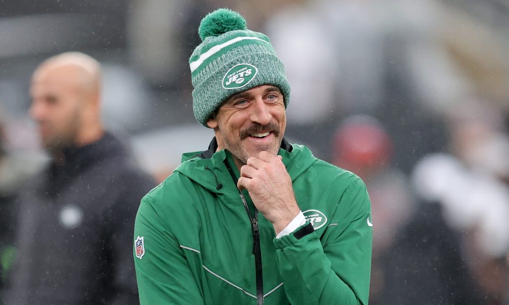 Dec 3, 2023; East Rutherford, New Jersey, USA; New York Jets quarterback Aaron Rodgers (8) watches warm ups before a game against the Atlanta Falcons at MetLife Stadium.