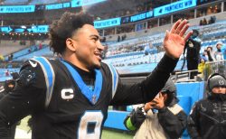 Dec 17, 2023; Charlotte, North Carolina, USA; Carolina Panthers quarterback Bryce Young (9) acknowledges the crowd as he runs off the filed at Bank of America Stadium.