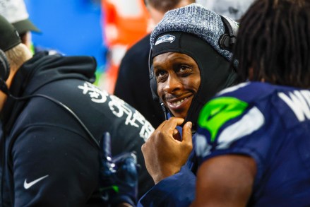 eattle Seahawks quarterback Geno Smith (7) sits on the bench during the fourth quarter against the Philadelphia Eagles at Lumen Field