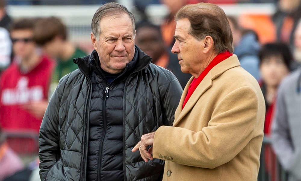 Alabama head coach Nick Saban at right talks with New England Patriots head coach Bill Belichick during Senior Bowl practice at Ladd-Peebles Stadium