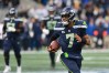 Seattle Seahawks quarterback Geno Smith (7) carries the ball against the Pittsburgh Steelers during the second half at Lumen Field