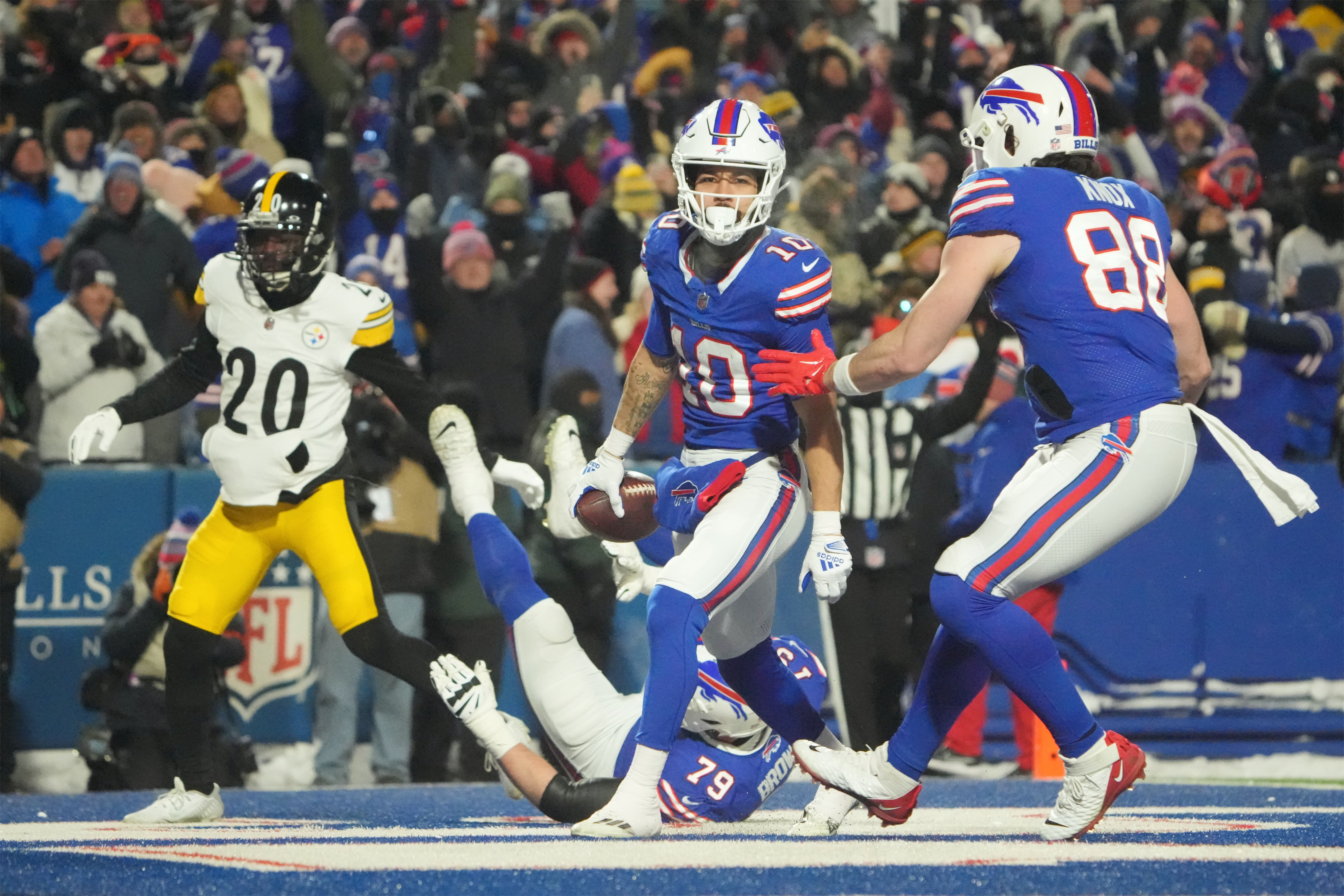 Buffalo Bills wide receiver Khalil Shakir (10) celebrates a touchdown in the second half against the Pittsburgh Steelers in a 2024 AFC wild card game at Highmark Stadium