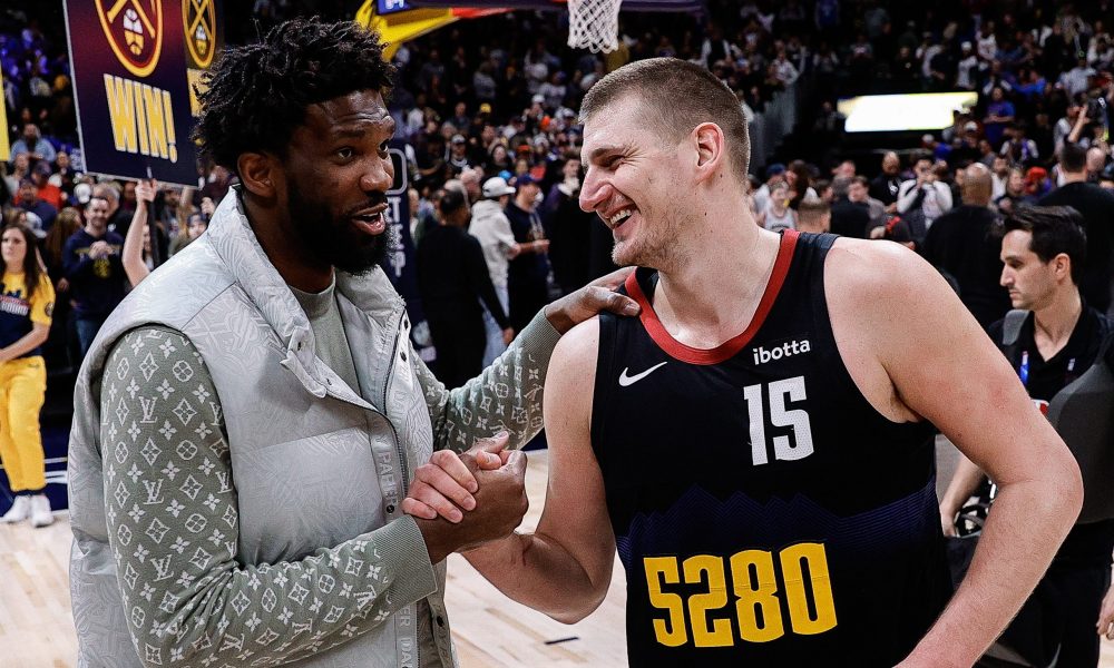 Jan 27, 2024; Denver, Colorado, USA; Philadelphia 76ers center Joel Embiid (21) and Denver Nuggets center Nikola Jokic (15) after the game at Ball Arena.