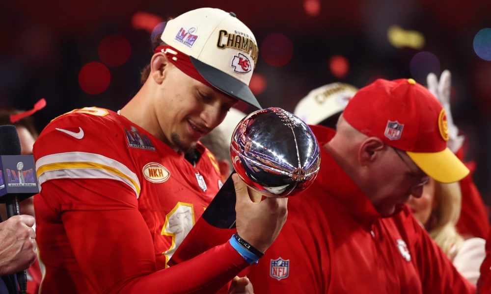 Feb 11, 2024; Paradise, Nevada, USA; Kansas City Chiefs quarterback Patrick Mahomes (15) celebrates with the Vince Lombardi Trophy after defeating the San Francisco 49ers in Super Bowl LVIII at Allegiant Stadium.