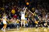 Iowa guard Caitlin Clark makes a 3-point basket setting the record for all-time leading scoring during a NCAA Big Ten Conference women's basketball game against Michigan, Thursday, Feb. 15, 2024