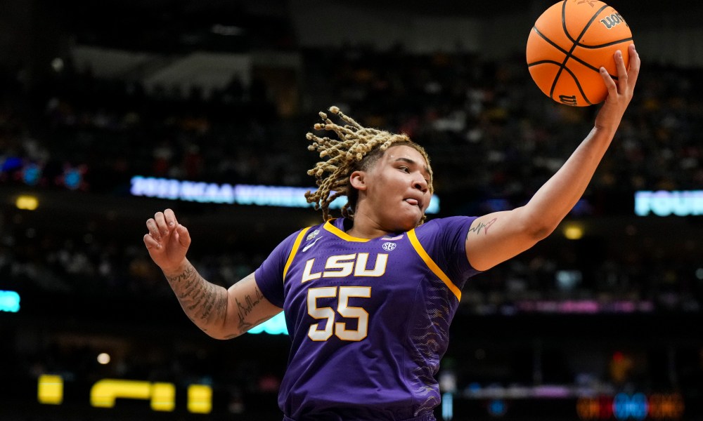 LSU Lady Tigers guard Kateri Poole (55) grabs a rebound against the Virginia Tech Hokies in the first half in semifinals of the women's Final Four of the 2023 NCAA Tournament at American Airlines Center
