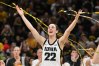 Iowa Hawkeyes guard Caitlin Clark (22) reacts during senior day after the game against the Ohio State Buckeyes. Clark broke the NCAA basketball all-time scoring record during the second quarter