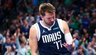Mar 17, 2024; Dallas, Texas, USA; Dallas Mavericks guard Luka Doncic (77) reacts after scoring during the second half against the Denver Nuggets at American Airlines Center.