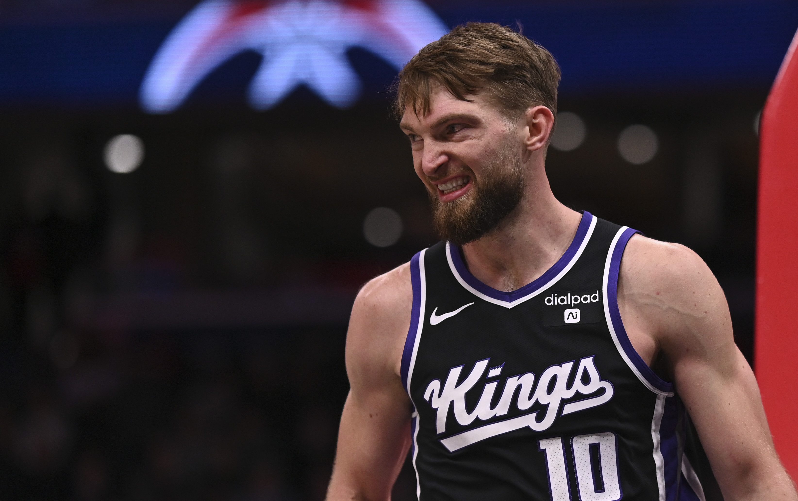 Mar 21, 2024; Washington, District of Columbia, USA;  Sacramento Kings forward Domantas Sabonis (10) reacts after being fouled while shooting  during the first half against the Washington Wizards at Capital One Arena. 